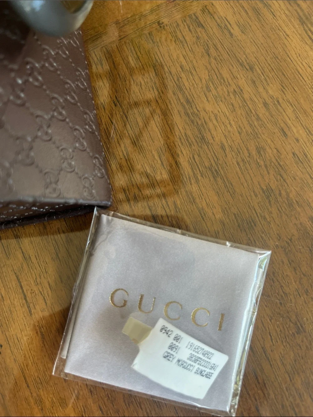 Gucci Women’s Round Sunglasses in Gray with Gold Logo